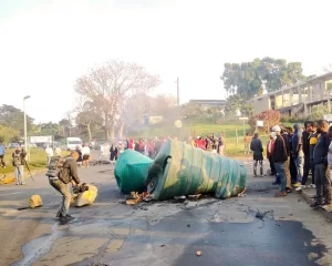 A torched water tank during a protest staged by residents of Tongaat and Hambanathi after more than 100 days without water following the devastating April floods. Photo : Don Perumal